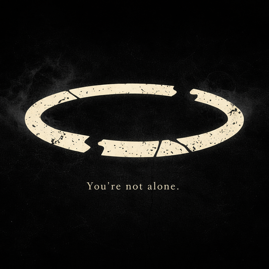 Silhouette of a broken halowith 'You're not alone.' text on a black background